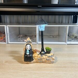 Decorative Figurine with Lamp and Character